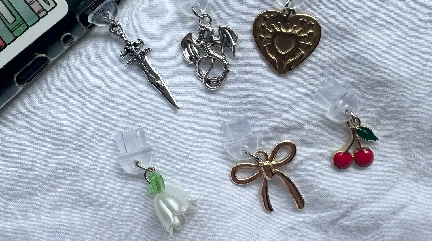 Kindle dust plug charms