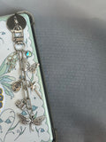 Whimsical E-reader charm